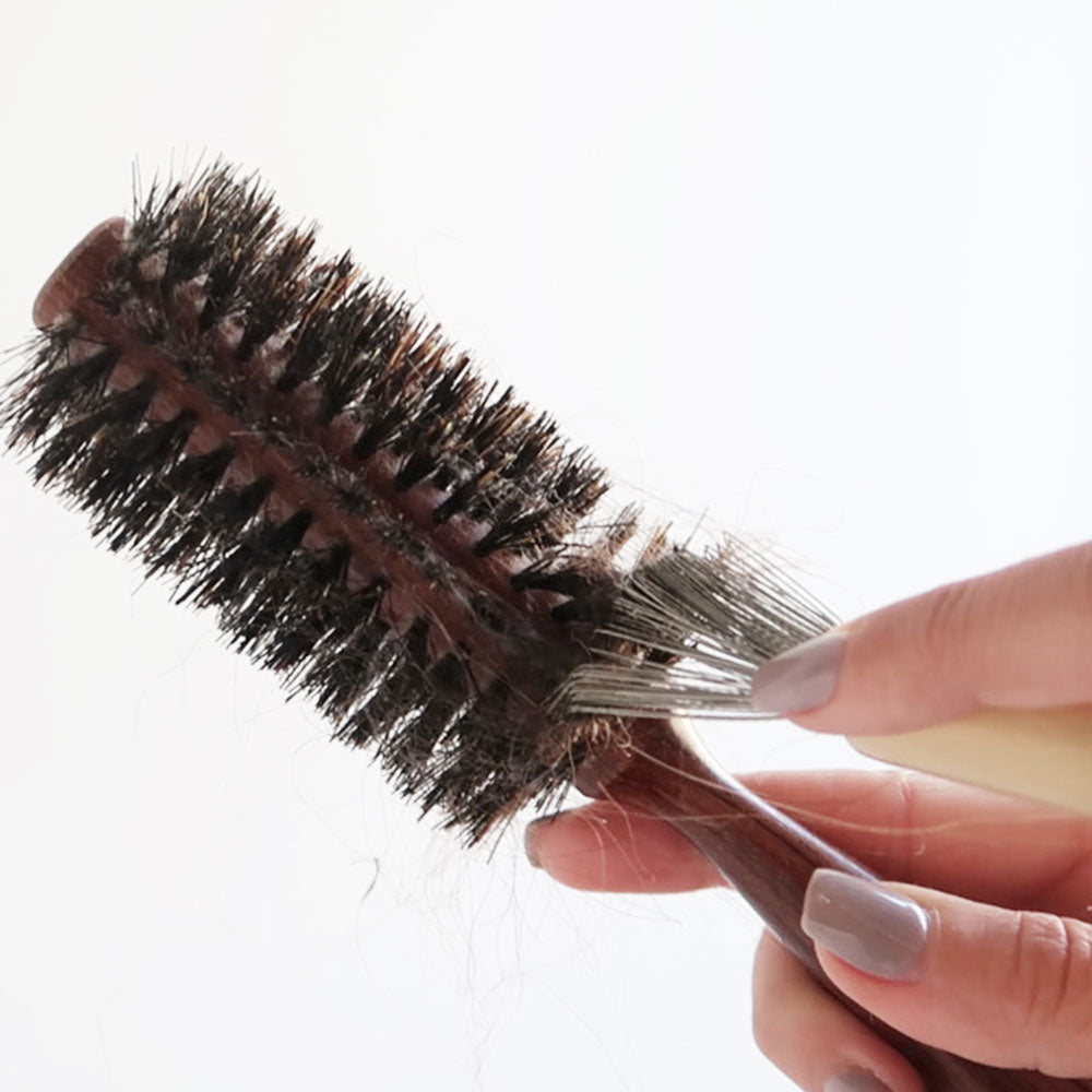 Nettoyeur de Brosse à Cheveux en action